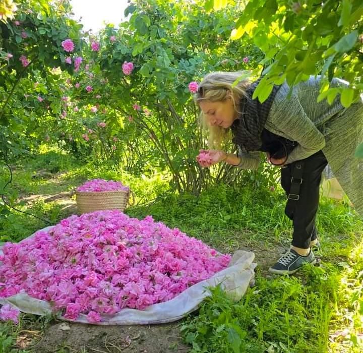 woman smelling flowers