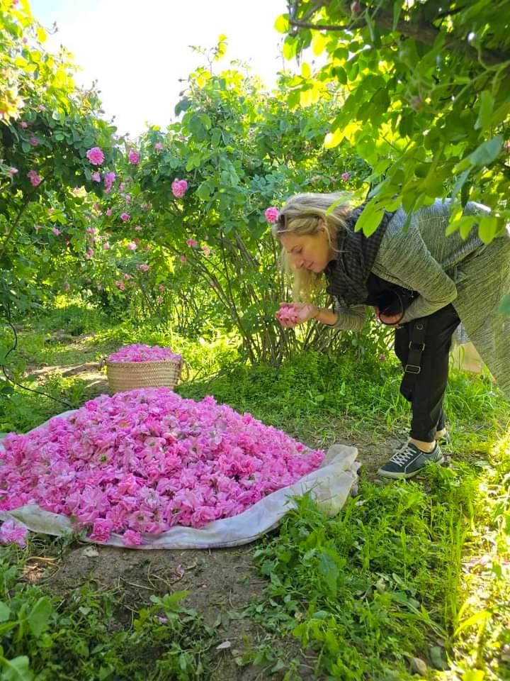 woman smelling flowers