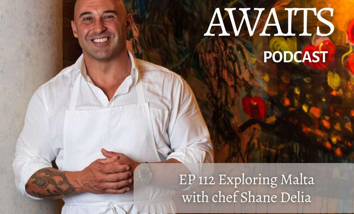 Chef leaning against wall