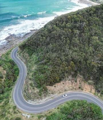 Road along coast with sea